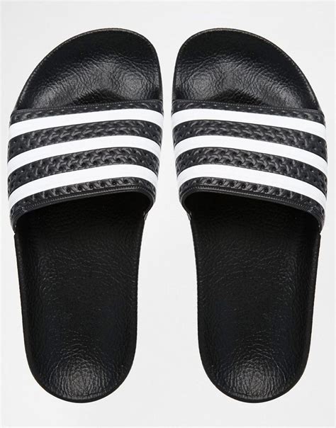 adidas slippers all black.